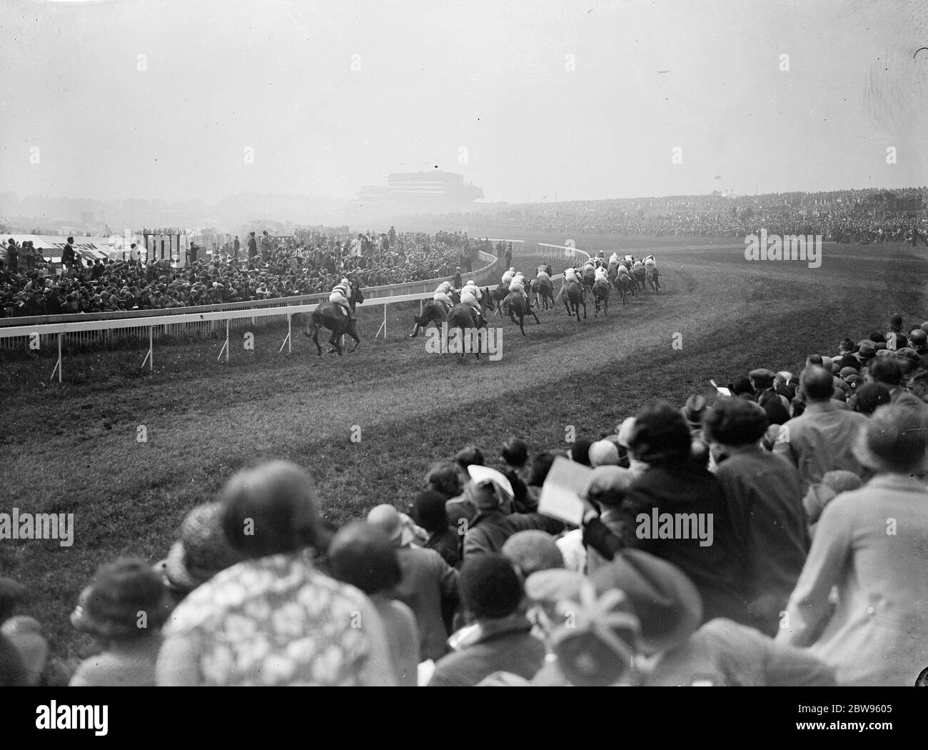 Actor wins the Derby with outsider . Mr Tom Walls , the actor , won the Derby one of the greatest classic races of the turf at Epsom , England , with his outsider April and Fifth , Dastur , owned by the Aga Khan , was second , and Lord Roseberry 's Miracle third . The field rounding Tattenham Corner . 1 June 1932 Stock Photo