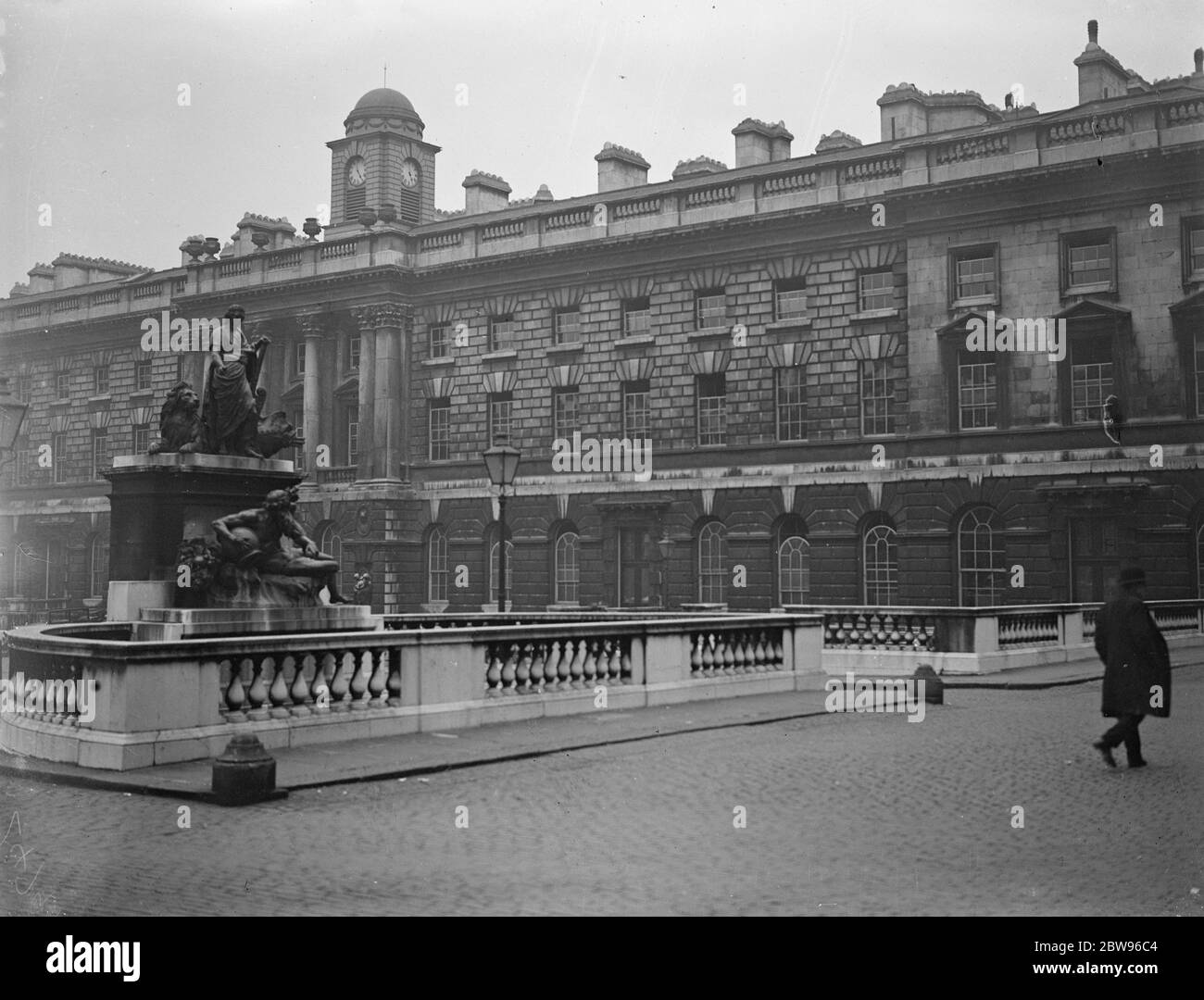 Plot to hold up Somerset house . A plot has been revealed , of plans to rob Somerset house officials in officials in the Strand of £ 80 , 000 have been revealed , and were disclosed when Scotland Yard detectives overheard the conspirators at the bud . A view of the exterior of Somerset House , where the attack was planned . 25 April 1932 Stock Photo