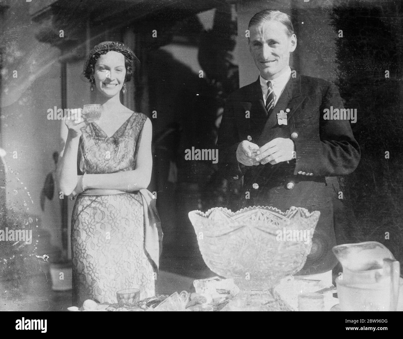 Lord Burghley drinks toast to success of British Games . 5 August 1932 Stock Photo