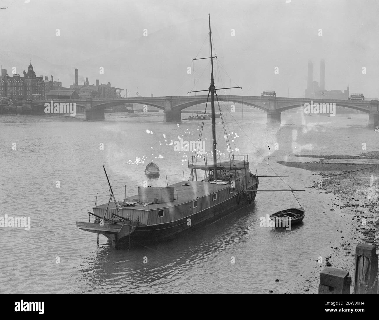 Training ship afloat again after being sunk in Thames . The training ship Nelson , which sank at her moorings on the Thames off Chelsea Embankment , was floated again at low tide . the vessel was used by sea scouts for training . The Nelson afloat again after her mishap . 1 October 1932 Stock Photo