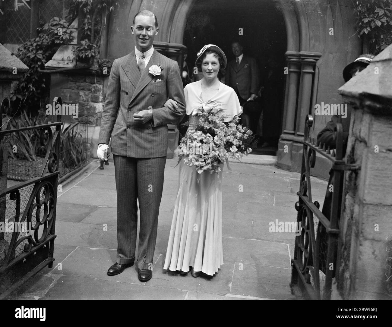 Engaged couples act as best man and only bridesmaid at wedding of Viscount ' s son . The best man , Mr Mortimer Goodall , and the only bridesmaid , Miss Vanne Joseph , at the wedding of the Hon Byron Carey , second son of Viscount and Viscountess Falkland to his third cousin , Miss Daphne Helen King , are to marry shortly . Mr Motimer Goodall and Miss Vanne Joseph , leaving the church after acting at the ceremony , which took place quietly at St Judes Church , Courtfield Gardens , london . 22 June 1932 Stock Photo