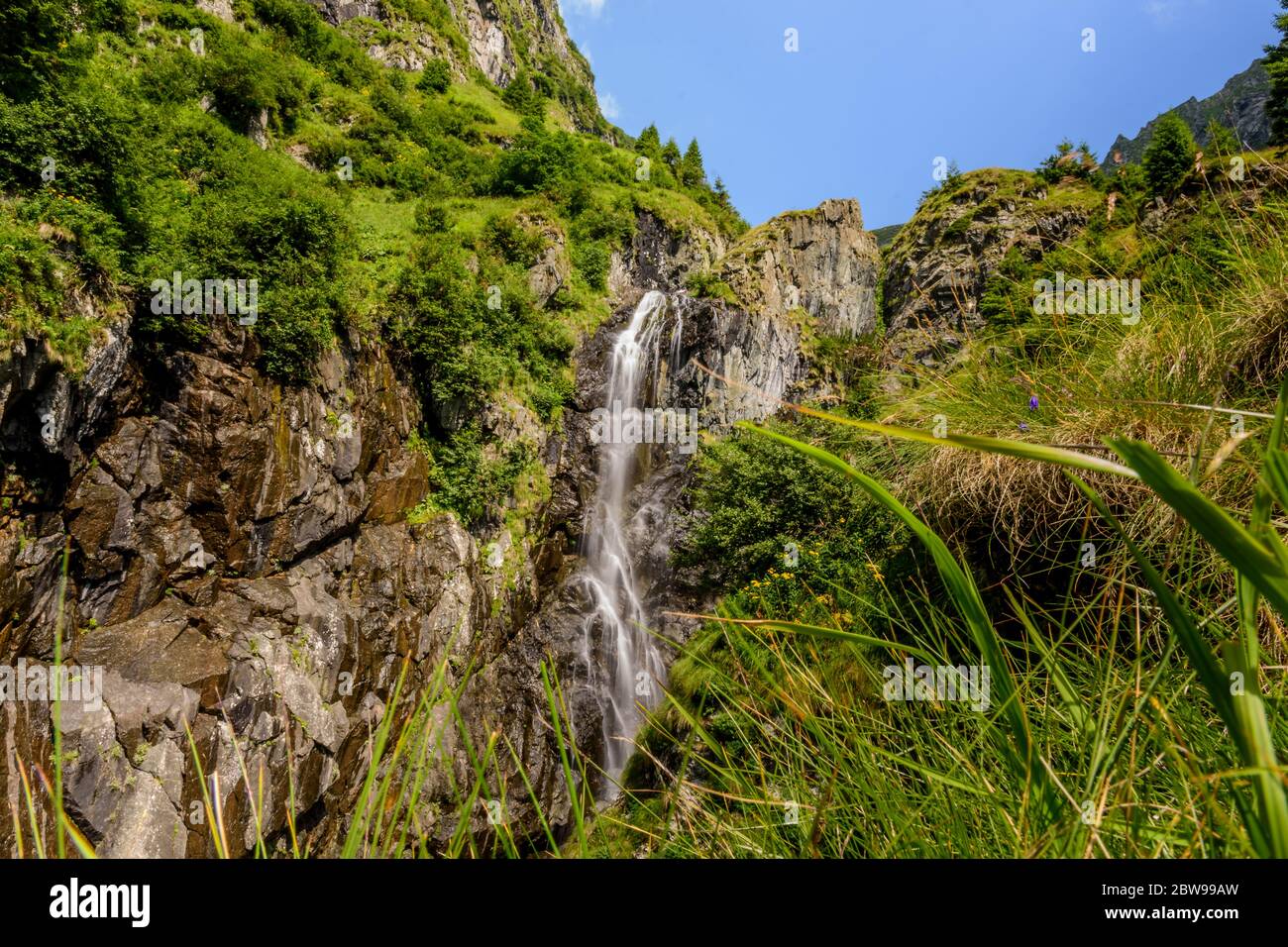 Beautiful waterfall landscape on a summer day from Fagaras Mountains, Romania Stock Photo