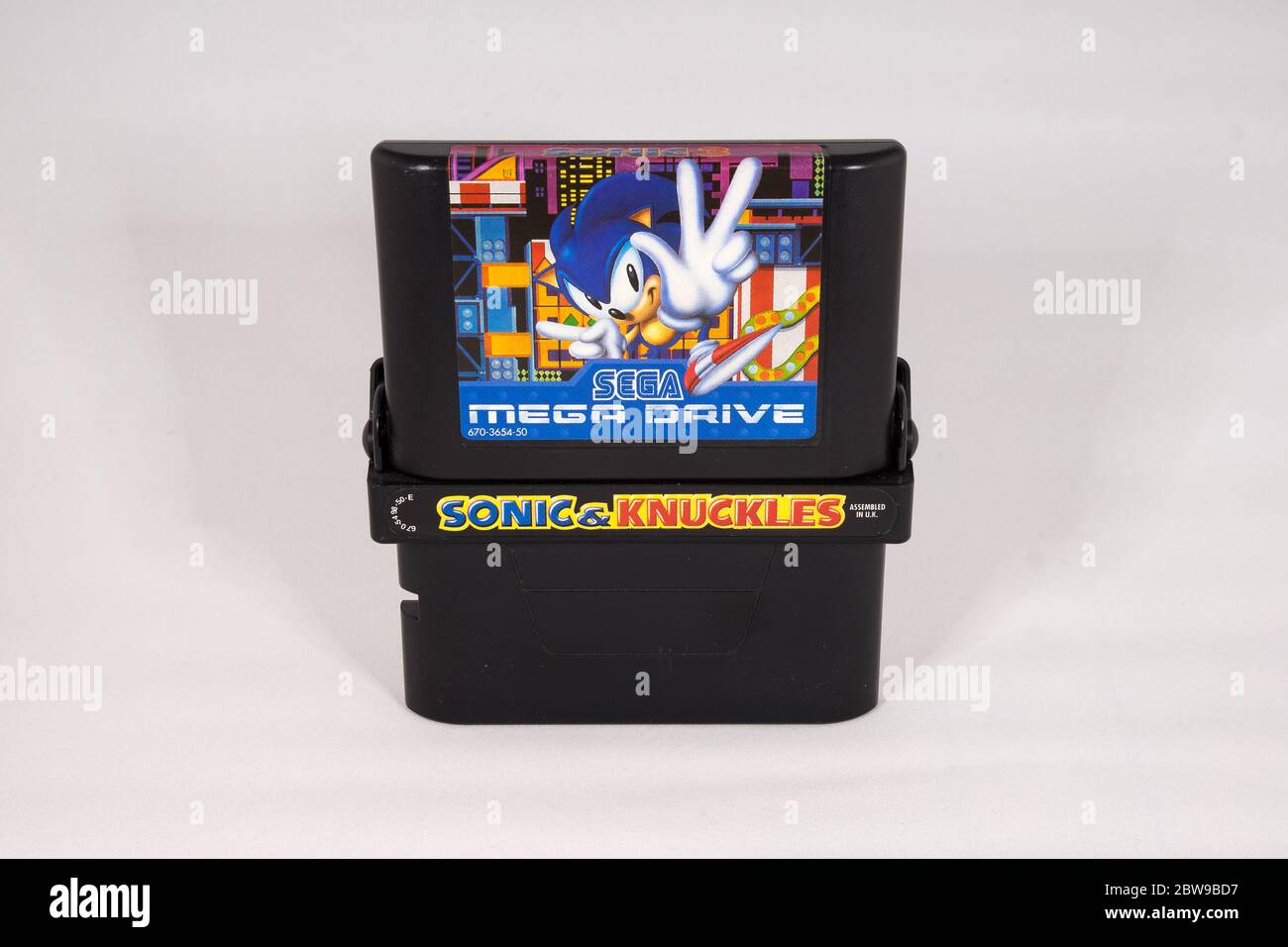 Sega Mega Drive cartridges, Sonic The Hedgehog 3 inserted into Sonic and Knuckles. Stock Photo