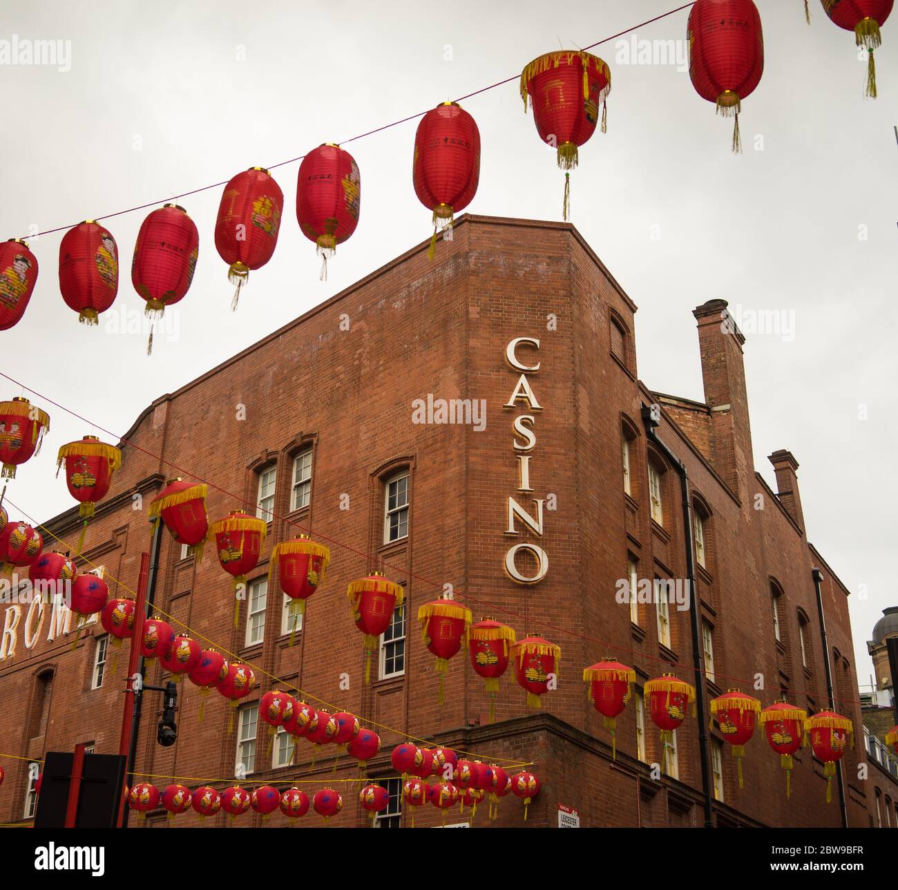 Hippodrome Casino sign viewed through the Chinese Lanterns of London's Chinatown in Leicester Square. London Stock Photo