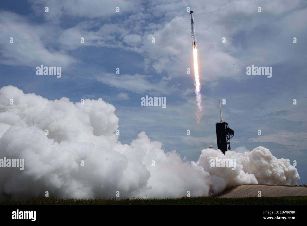 A SpaceX Falcon 9 rocket carrying the company's Crew Dragon spacecraft ...