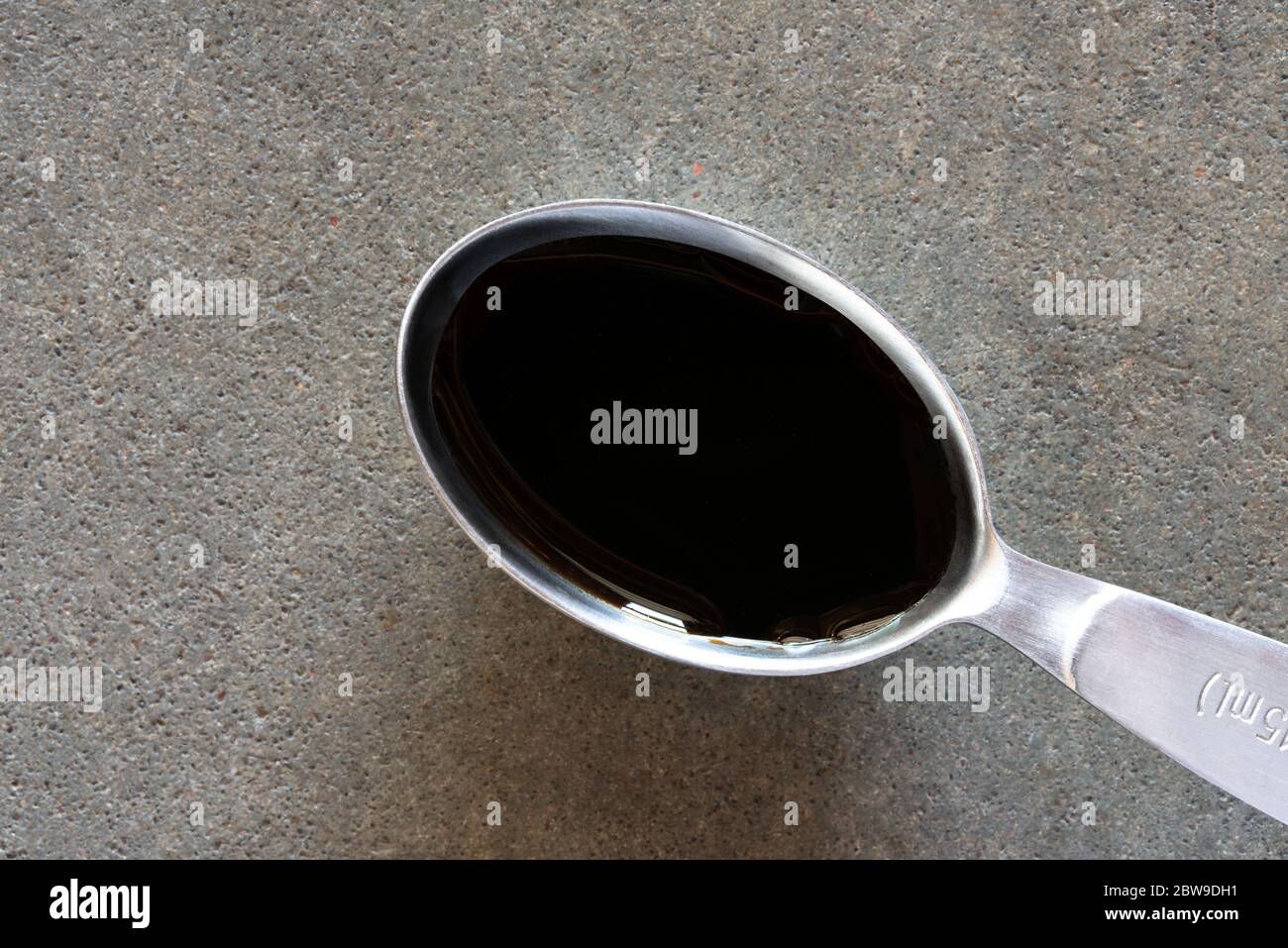 Balsamic Vinegar on a Teaspoon Stock Photo Alamy