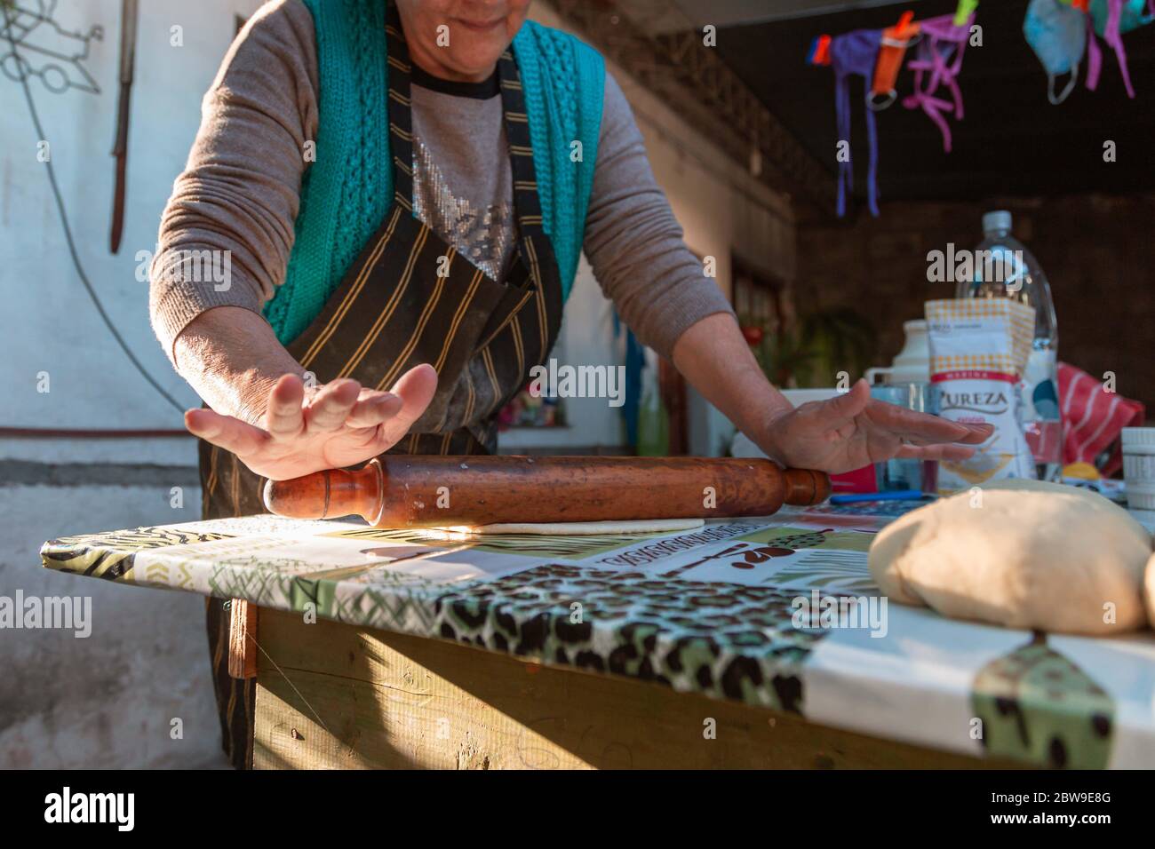 lady kneading on the table Stock Photo