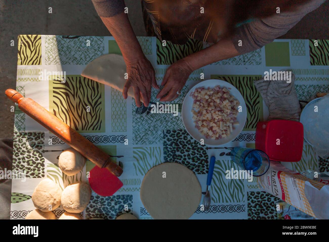 lady kneading on the table Stock Photo