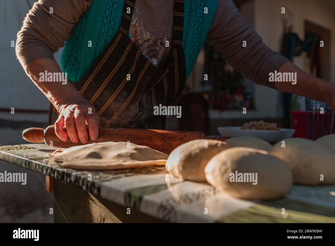 lady kneading on the table Stock Photo