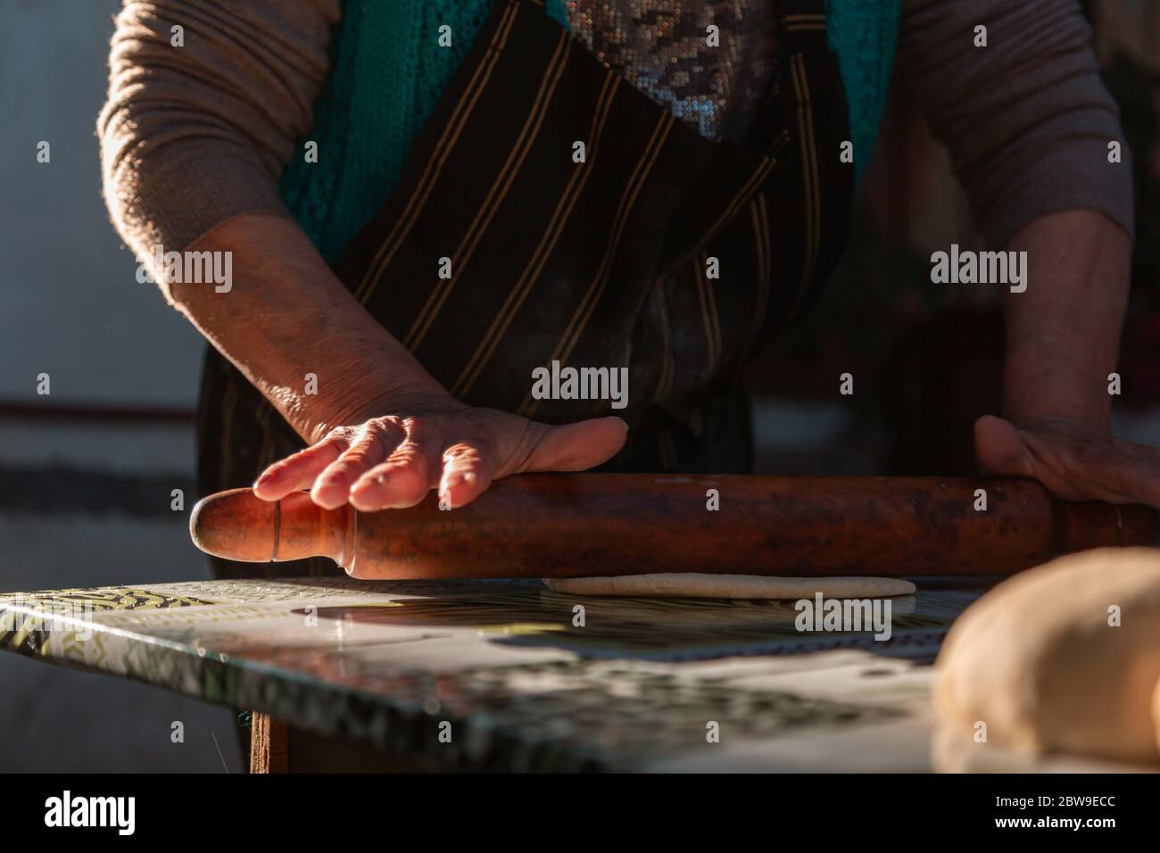 lady kneading on the table Stock Photo