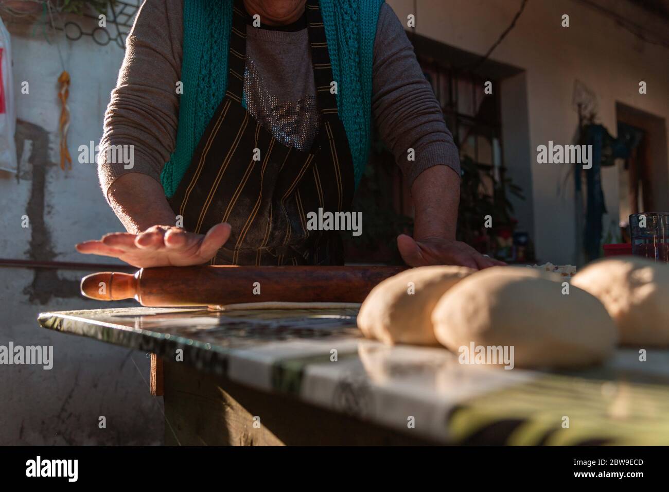 lady kneading on the table Stock Photo