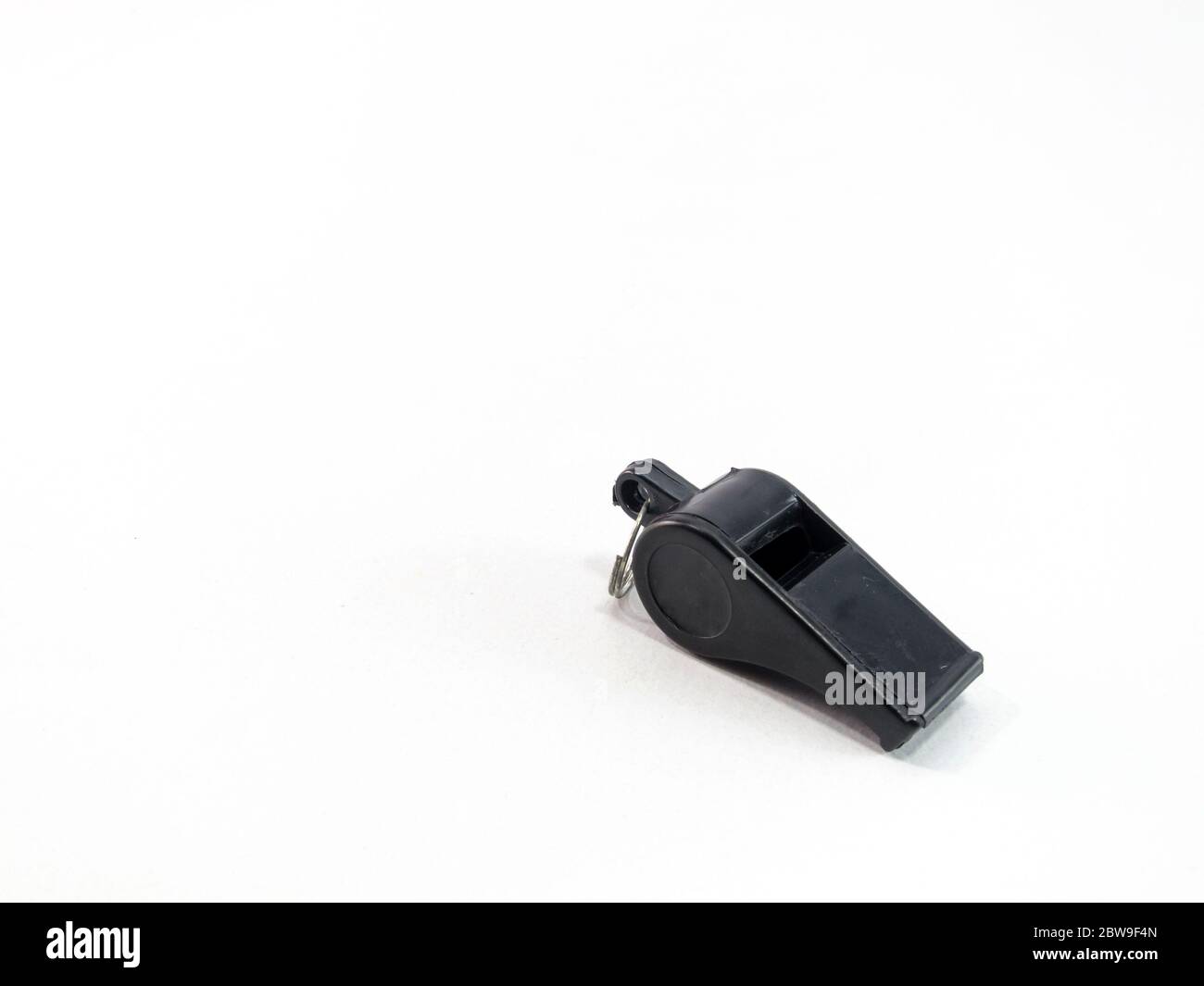 Black whistle is a white background Stock Photo Alamy