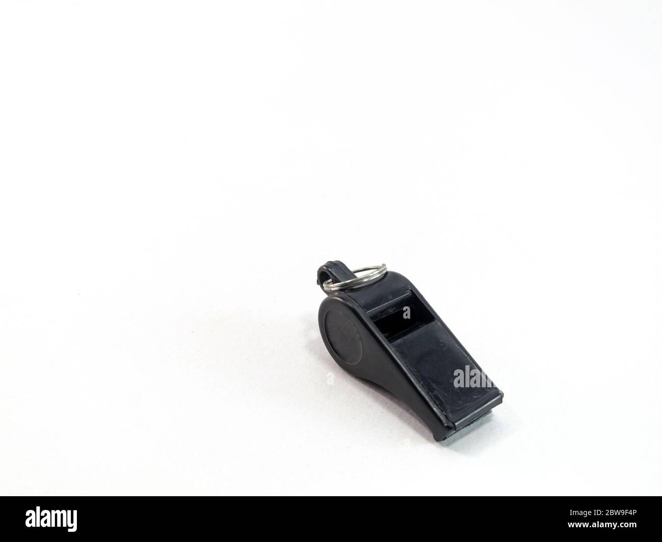 Black whistle is a white background Stock Photo Alamy