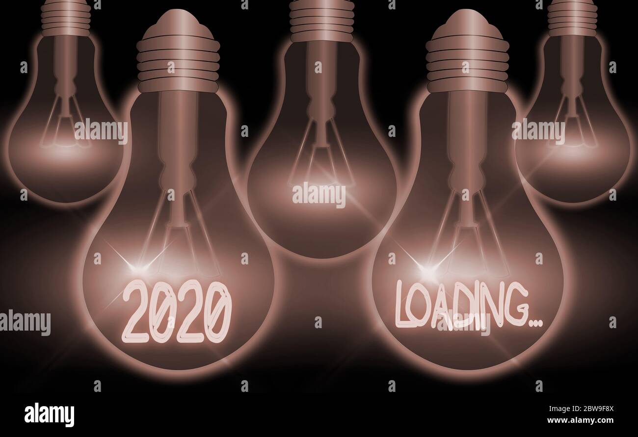Writing note showing 2020 Loading.... Business concept for a year ...