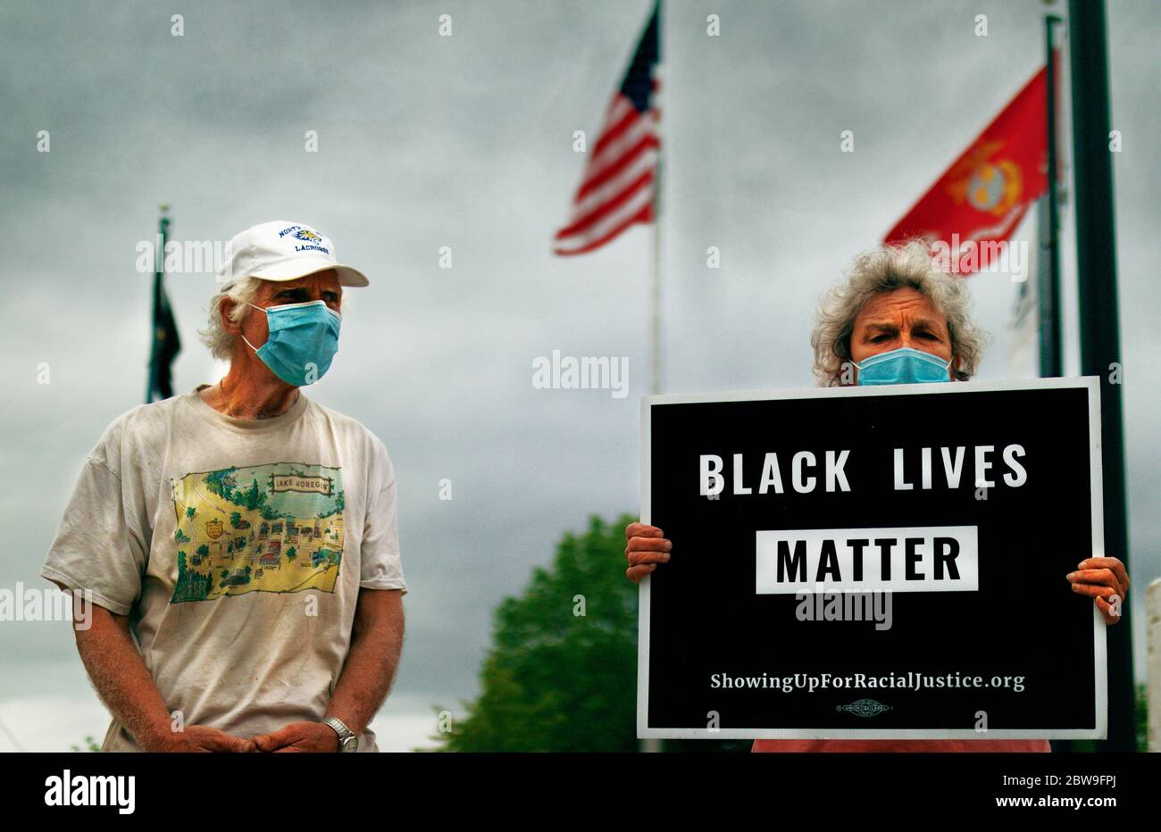 Two Protesters Hold A Black Lives Matter Sign Stock Photo