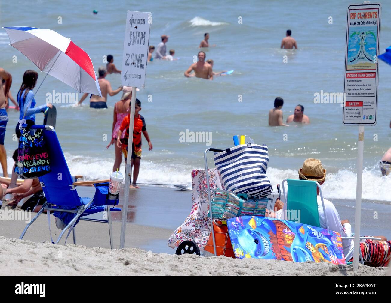 Cocoa Beach, United States. 30th May, 2020. People partake in beach