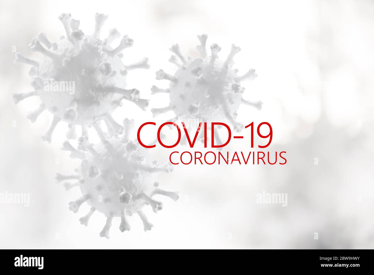 CoronavirusÂ models with Covid-19 sign Stock Photo