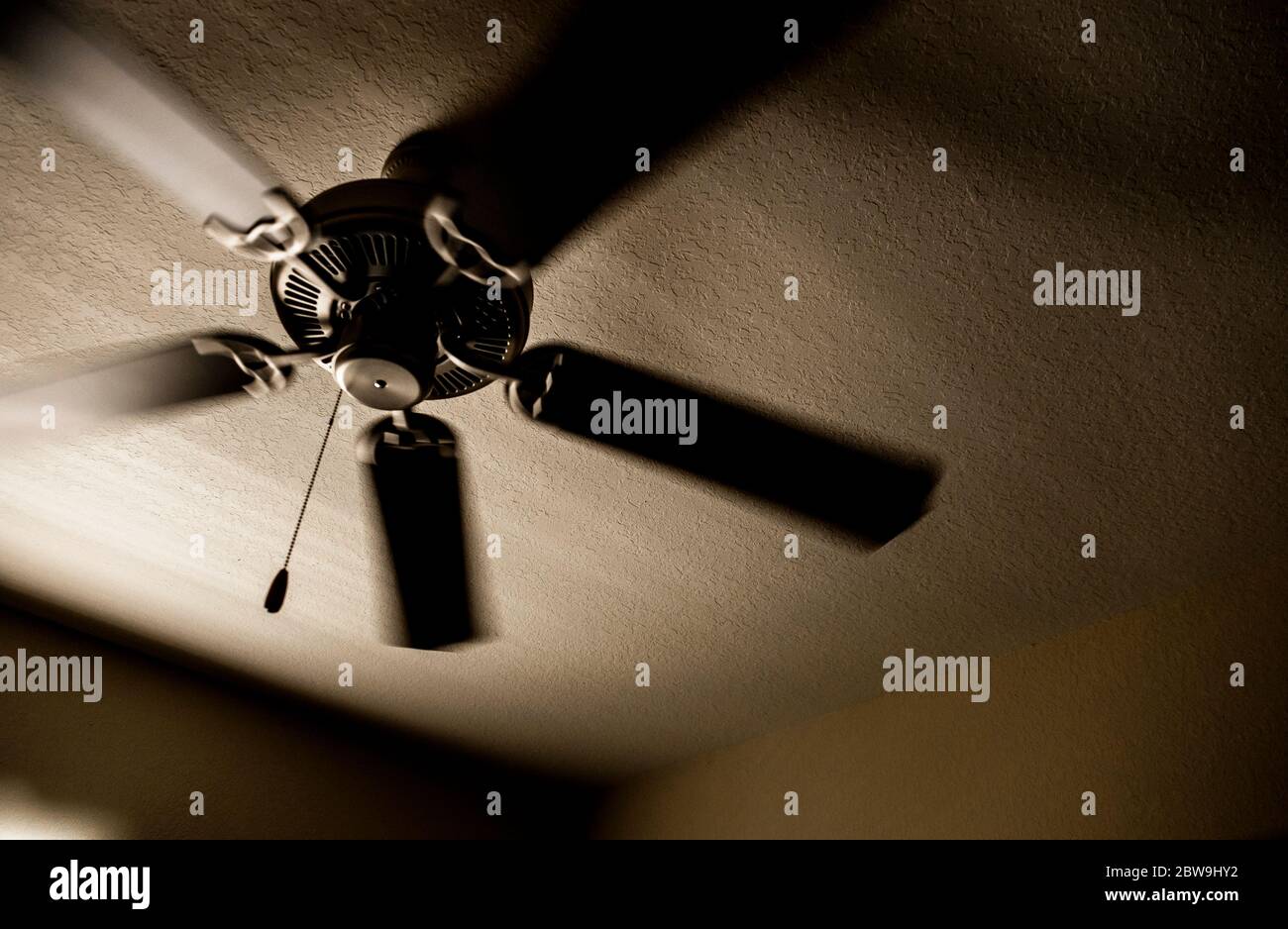 Low angle view of ceiling fan Stock Photo