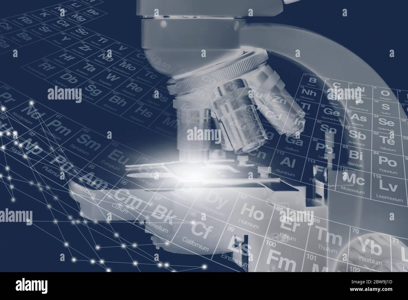 Digitally generated image of microscope and periodic table Stock Photo