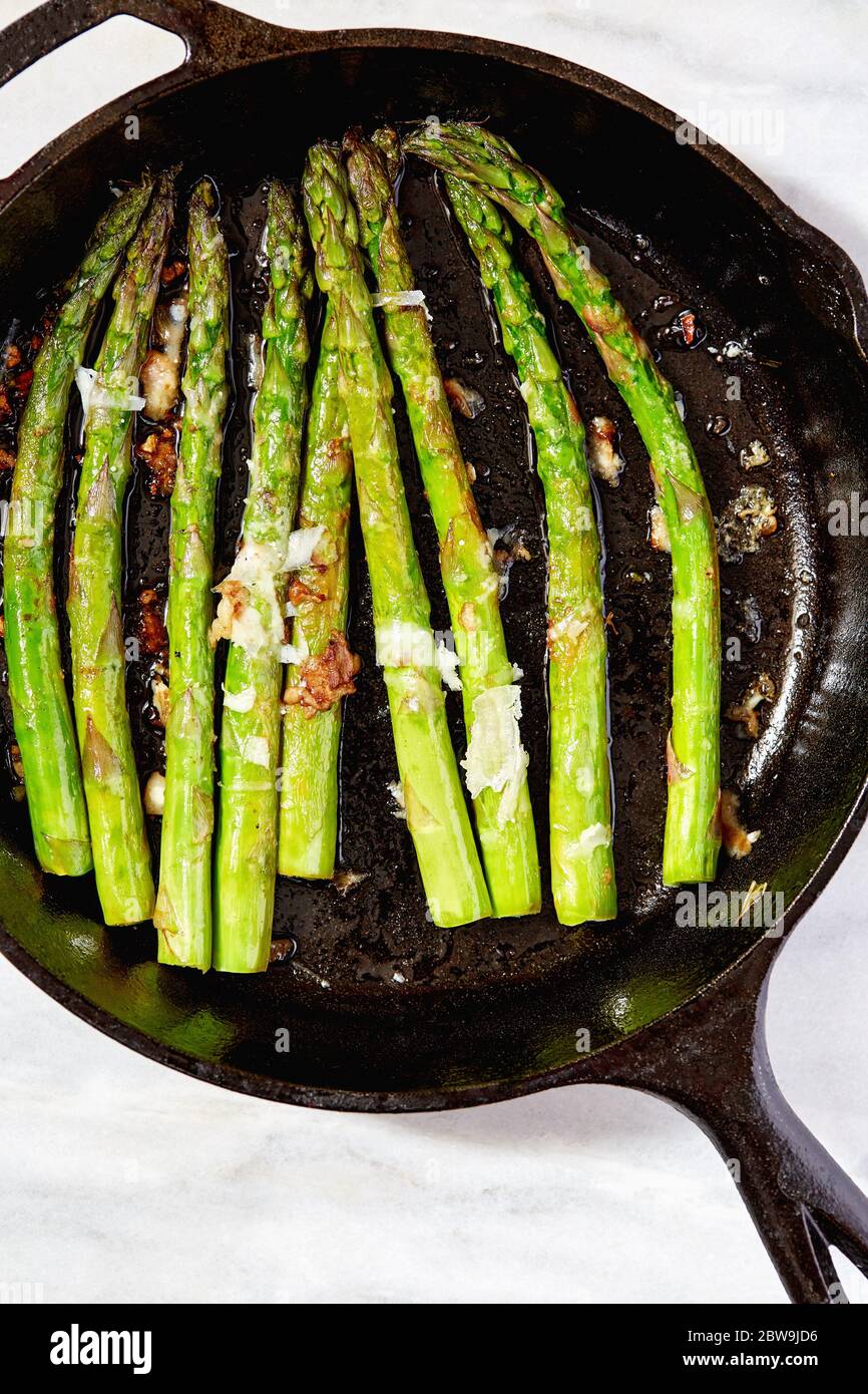Asparagus in cast iron skillet Stock Photo