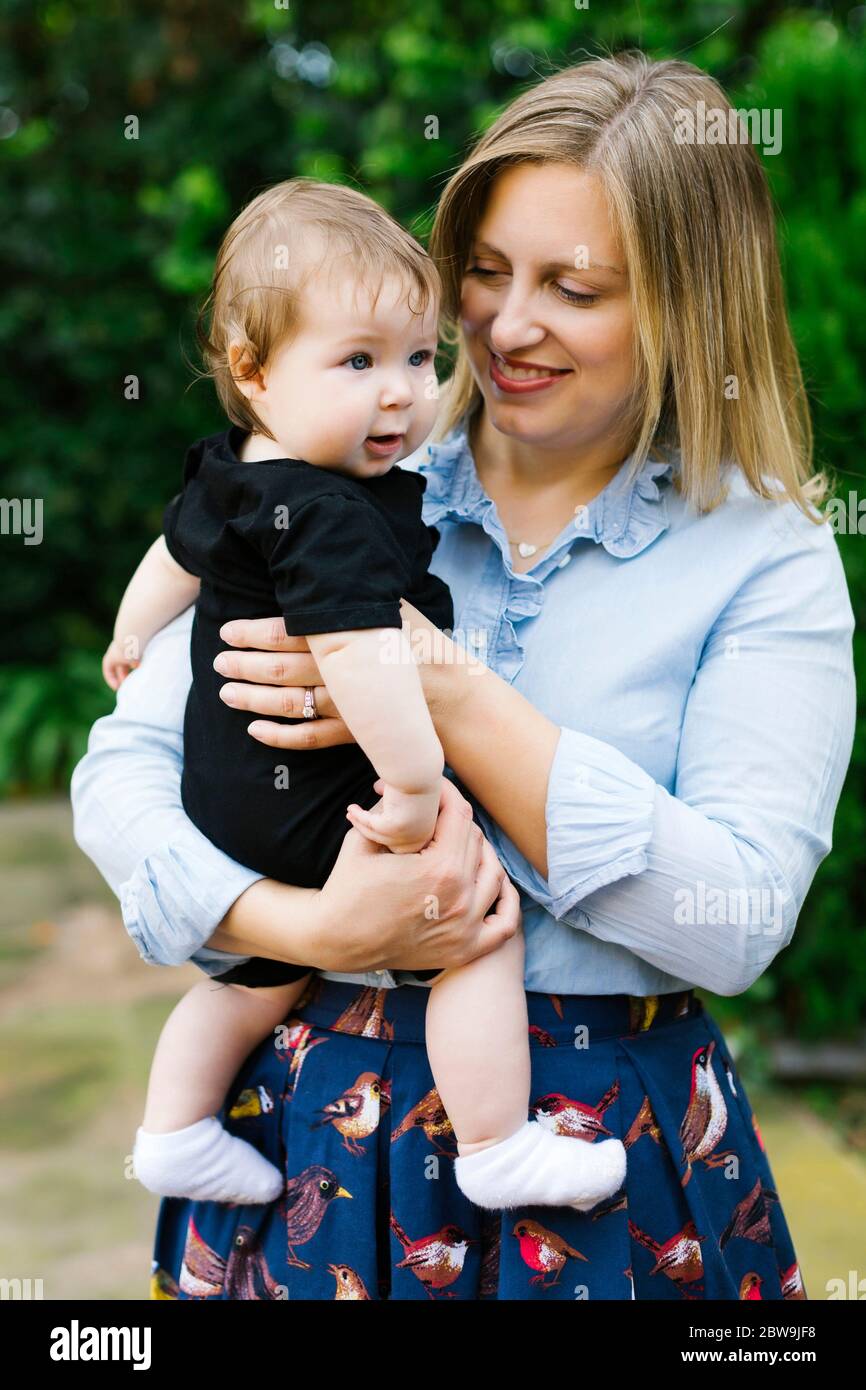 USA, California, Orange County, Mother holding daughter (23 Stock