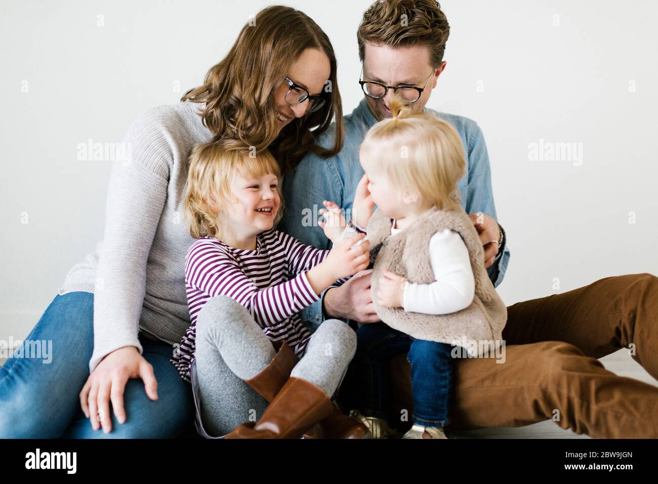 Portrait of family with daughters (2-3, 6-7) Stock Photo