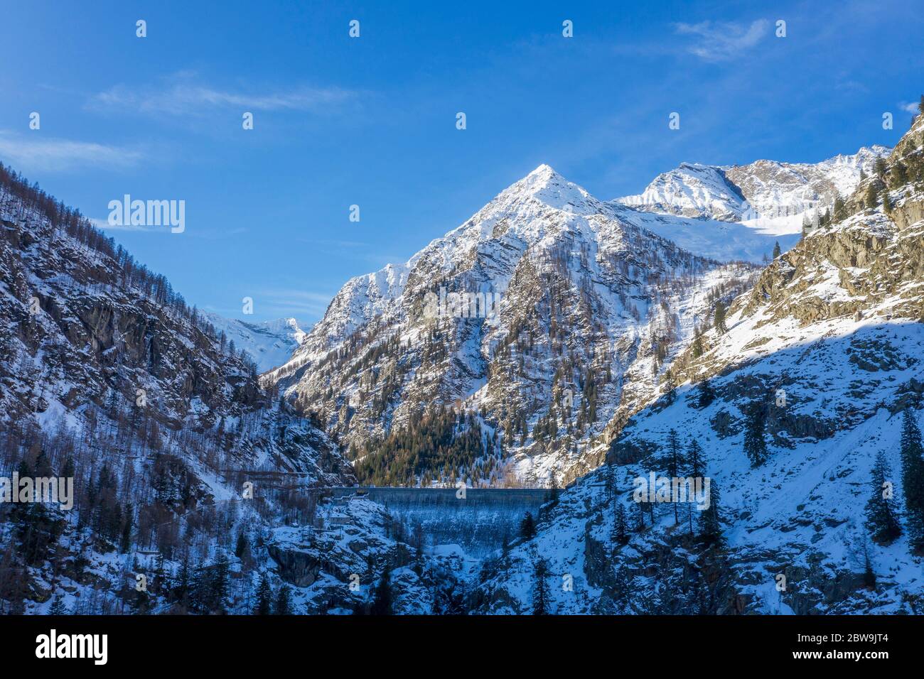 Italy, Piedmont, Italian Alps, Mountains on sunny day in winter Stock Photo