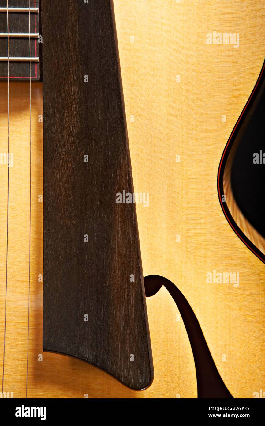 Close up of acoustic guitar saddle Stock Photo Alamy
