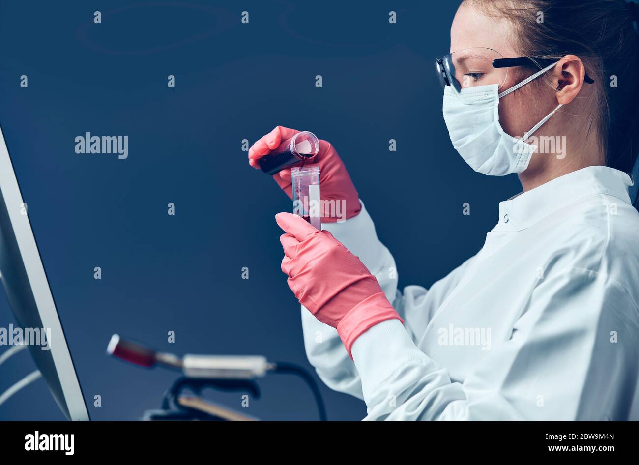 Female technician working in laboratory Stock Photo