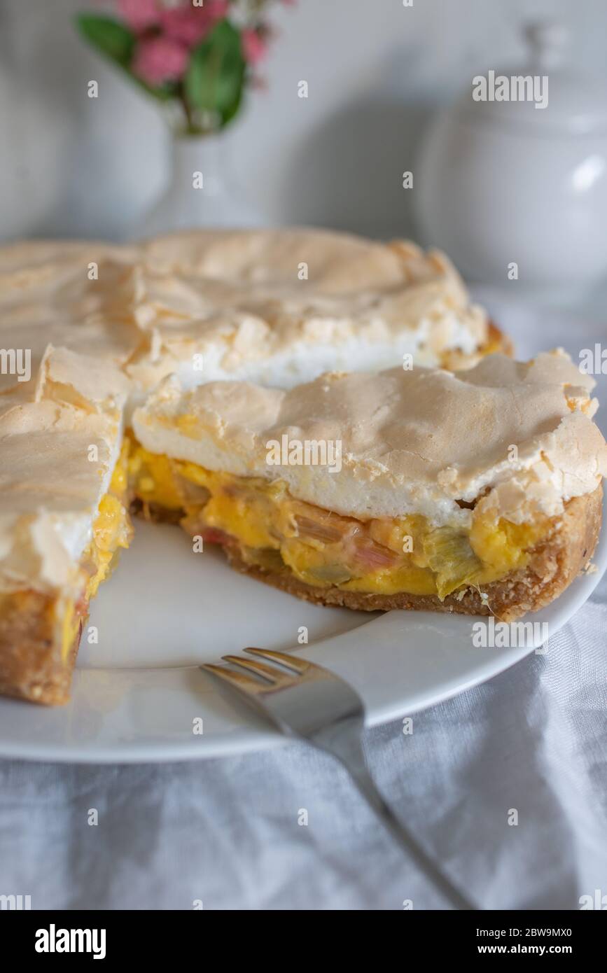 Home made rhubarb meringue cake on a plate Stock Photo