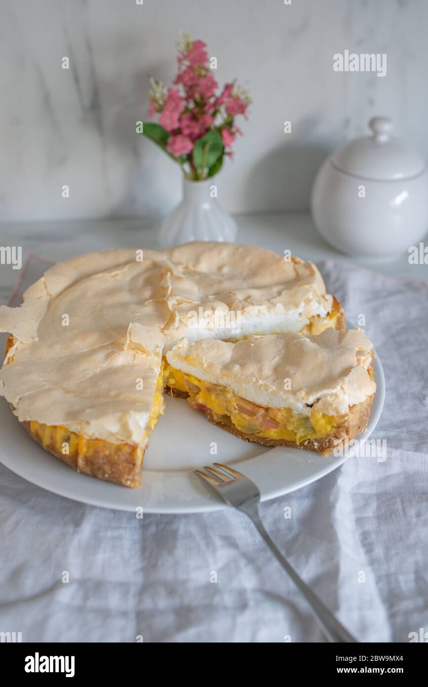 Home made rhubarb meringue cake on a plate Stock Photo