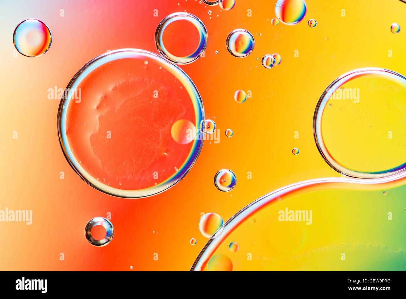 Beautiful And Fantastic Macro Photo Of Water Droplets In Oil With A Colorful Background Stock Photo Alamy