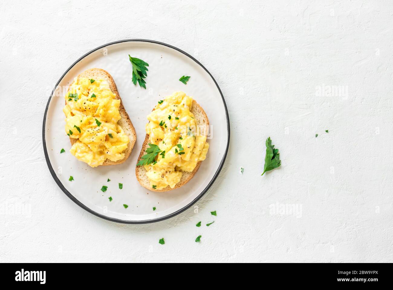 Scrambled Eggs On Toasts For Healthy Breakfast Or Brunch Top View Copy Space Homemade Meal Scrambled Eggs Sandwiches Stock Photo Alamy
