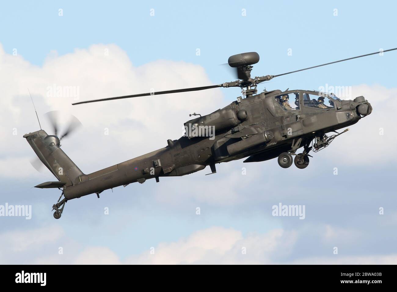 Army Air Corps Apache AH1 attack helicopter landing at Wattisham airfield in Suffolk. Stock Photo