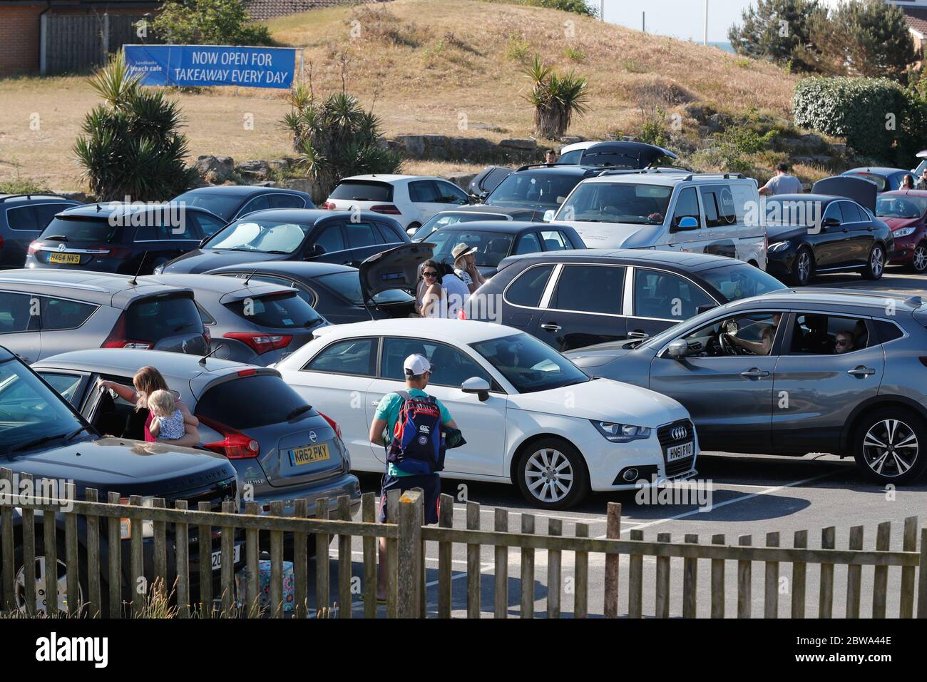 Poole, UK. 31st May 2020.    Beach visitors were arriving from before  8am and the  car park at Sandbanks in Poole, Dorset  was nearly full by 9am ready for a sunny  Sunday . Credit: Richard Crease/Alamy Live News Stock Photo