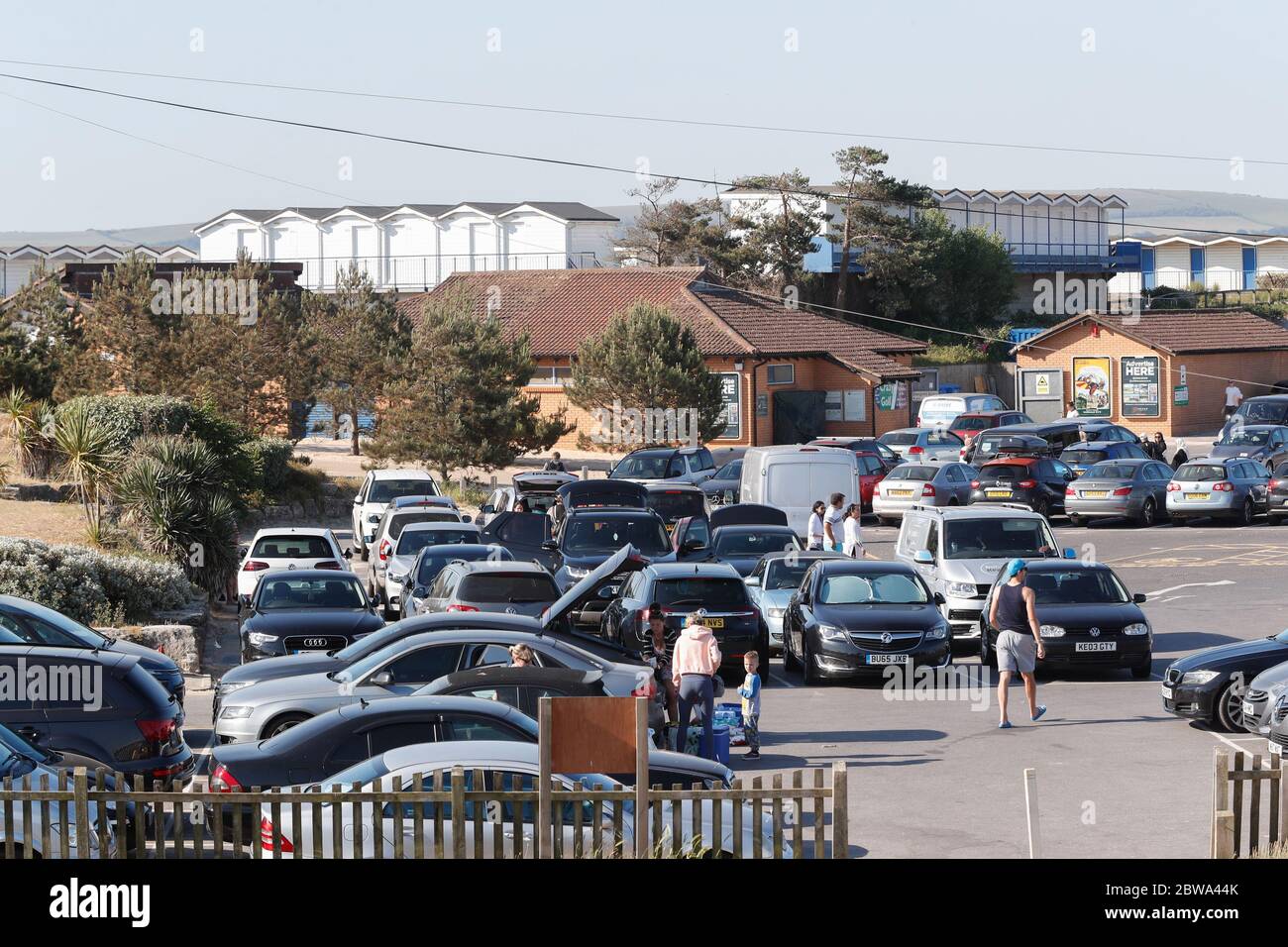 Poole, UK. 31st May 2020.    Beach visitors were arriving from before  8am and the  car park at Sandbanks in Poole, Dorset  was nearly full by 9am ready for a sunny  Sunday . Credit: Richard Crease/Alamy Live News Stock Photo