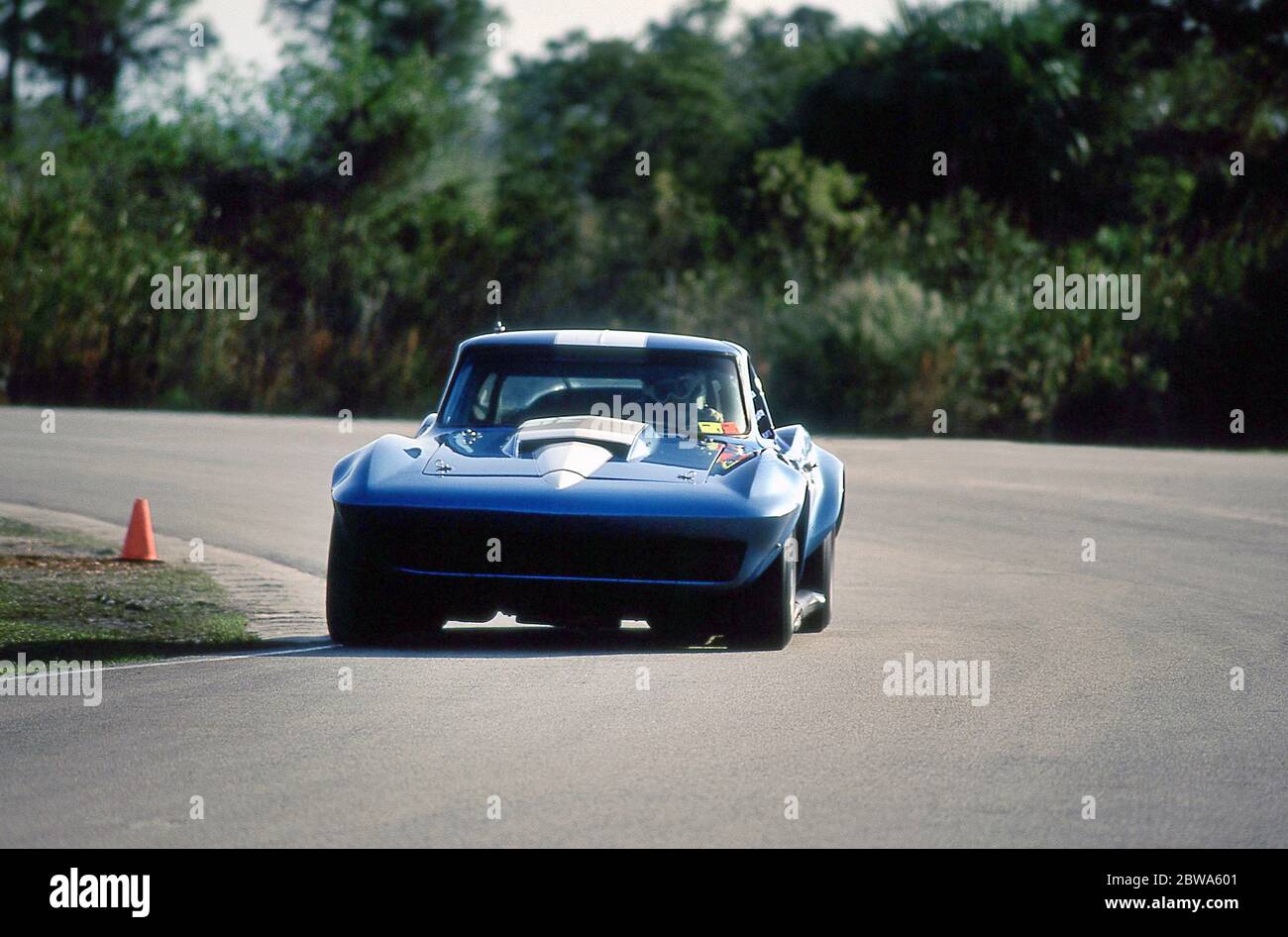 Chevrolet Corvette cars racing in a historic GT race at Moroso race track Florida 1992 Stock Photo