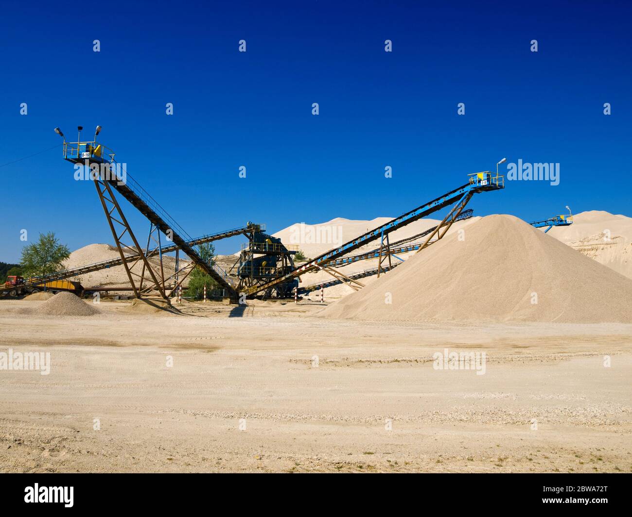 shot of sand mine machinery on sunny day Stock Photo