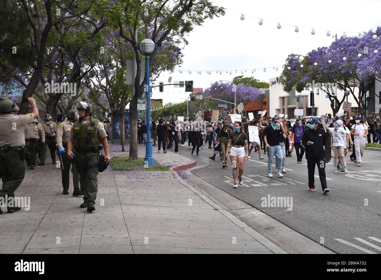 West Hollywood, CA/USA - May 30, 2020: Black Lives Matter protesters demanding justice for George Floyd and police on Santa Monica Blvd Stock Photo