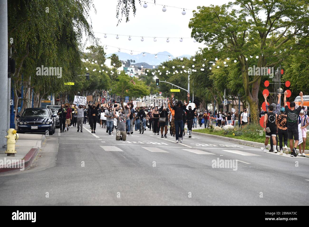 West Hollywood, CA/USA - May 30, 2020: Black Lives Matter protesters demanding justice for George Floyd on Santa Monica Blvd Stock Photo