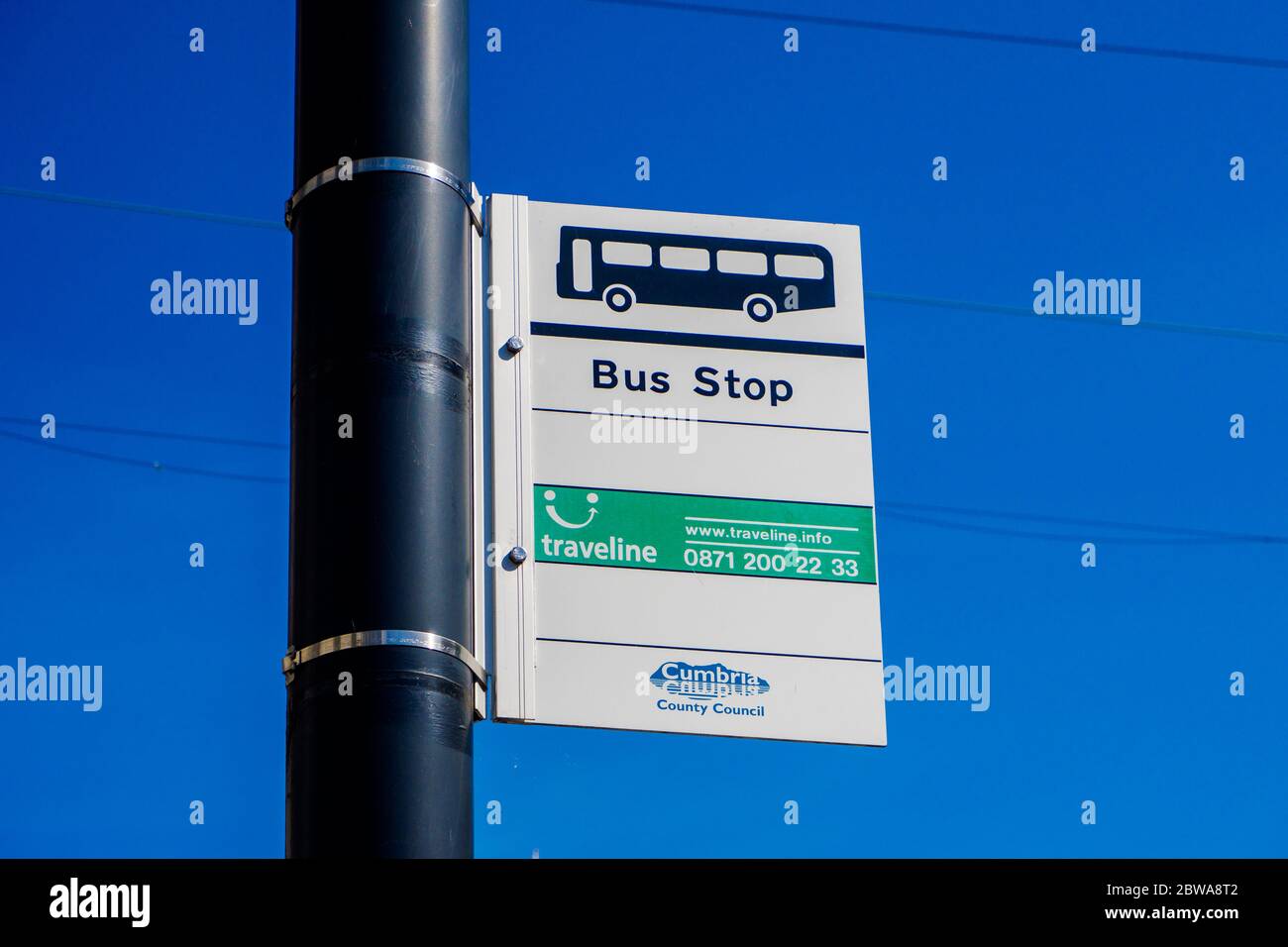 Bus Stop Sign with lovely blue sky behind UK Stock Photo - Alamy