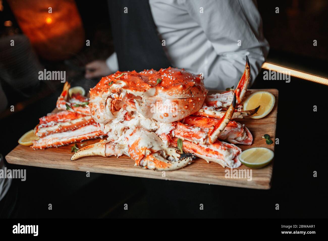 Royal crab with lime on a dsock Stock Photo