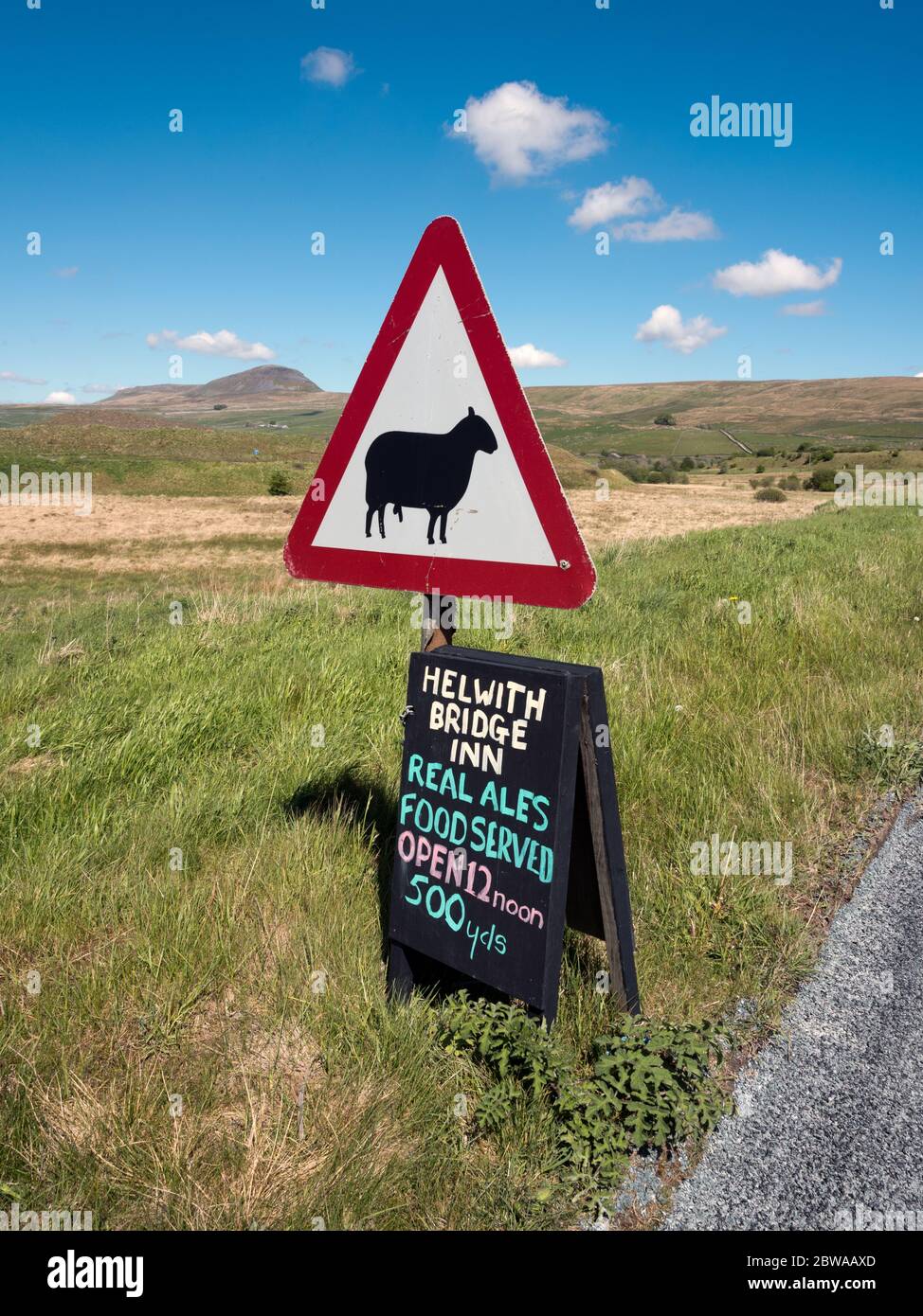 Advert sign for rural pub closed during the Covid-19 lockdown. Helwith Bridge, Yorkshire Dales National Park, UK. Stock Photo