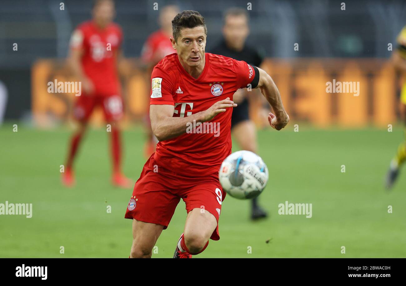 Signal Iduna Park Dortmund Germany, 26.05.2020, Football: Bundesliga Season  2019/20 matchday 28, Borussia Dortmund (BVB, yellow) vs FC Bayern Munich  (FCB, red) — Robert Lewandowski (FCB). Due to the Corona virus pandemic