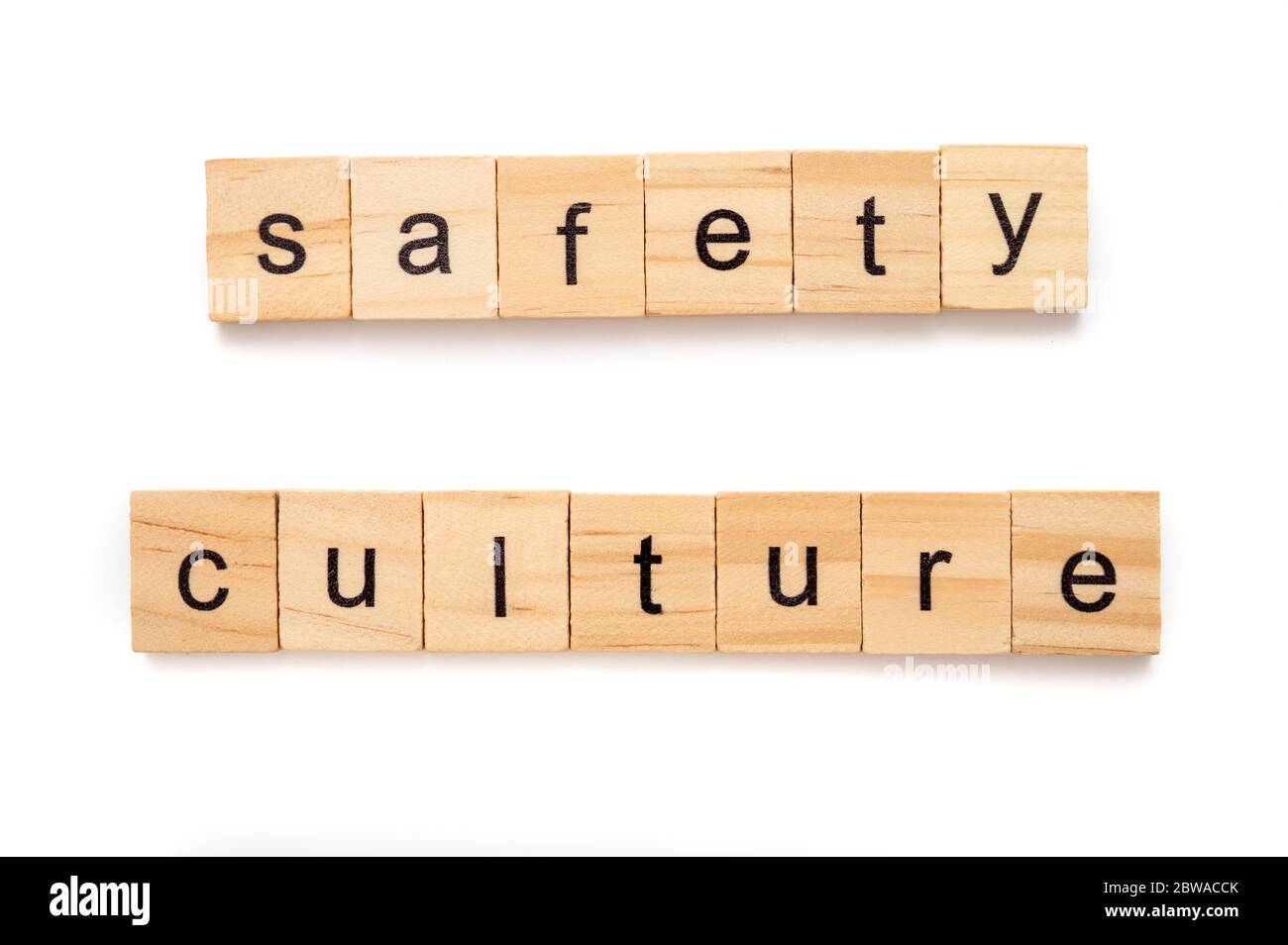 Wooden letter tiles spelling word SAFETY CULTURE Stock Photo