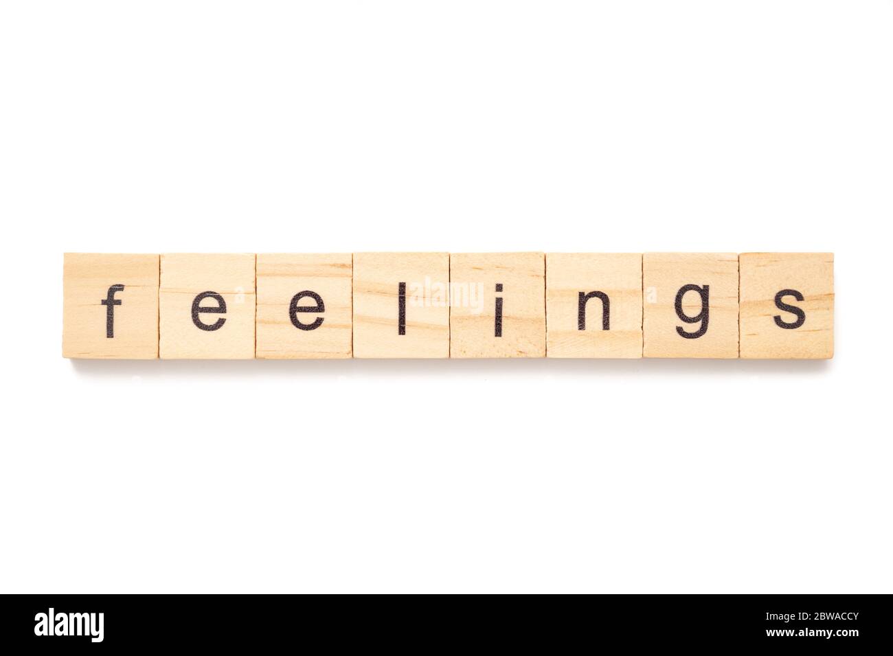 Wooden letter tiles spelling word FEELINGS Stock Photo