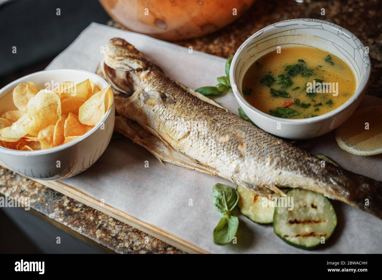 Fried sea bass fish hires stock photography and images Alamy