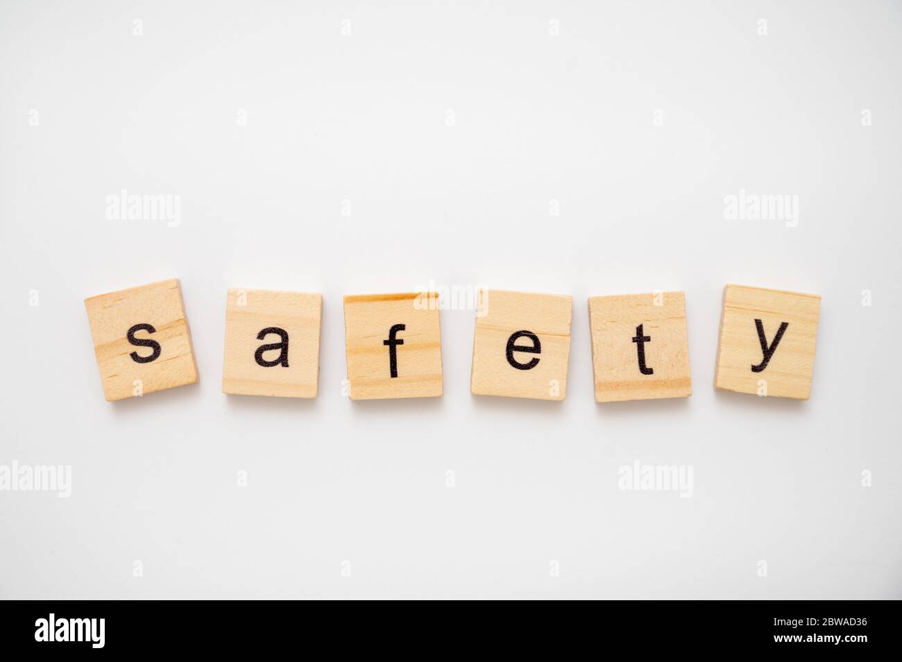 Wooden letter tiles spelling word SAFETY Stock Photo