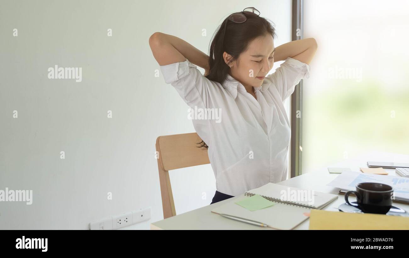Woman head in hands office desk hi-res stock photography and images - Alamy