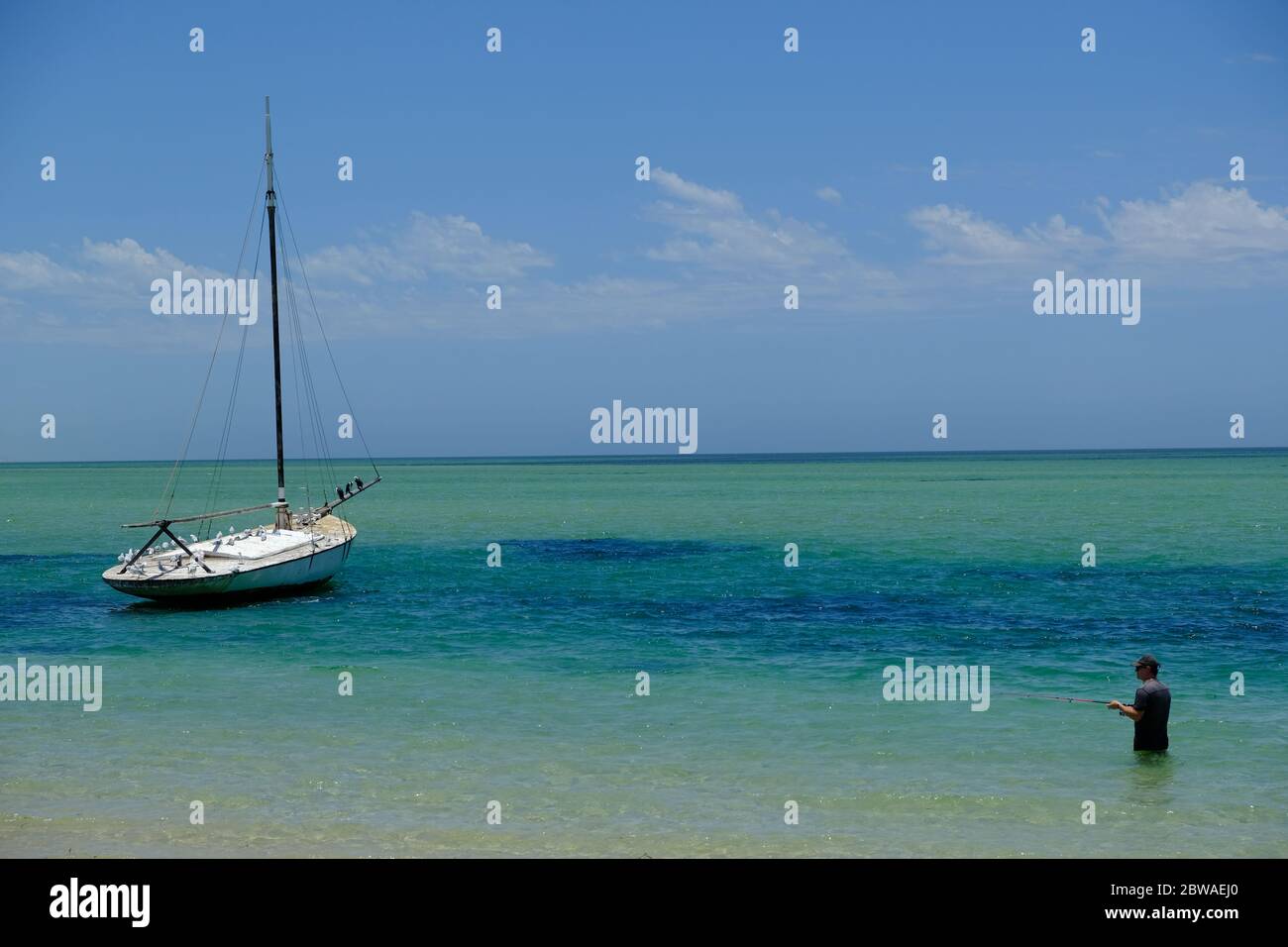 Western Australia Denham Shark Bay - Denham Costline sailing boat and fishermen Stock Photo